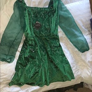 Green Dress with Sheer Sleeves and Silver Stars